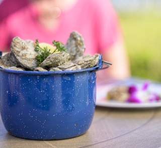 A pot of freshly steamed oysters