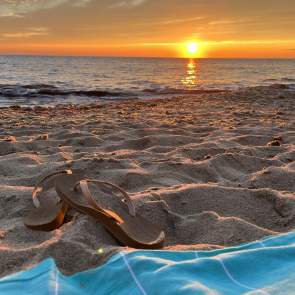 Flip flops in sand