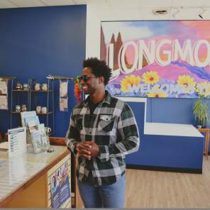 Man standing inside a visitor center