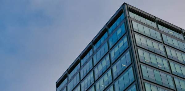 The top corner of the Colmore Building on Colmore Row, viewed from the street