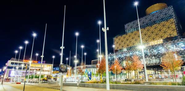 Birmingham Library at night, lit up by the free-standing lights of Centenary Square