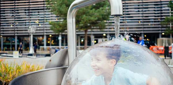 A boy enjoying an interactive exhibit at Birmingham's Thinktank Science Museum