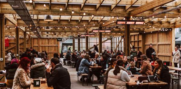 Large area of people enjoying a food event