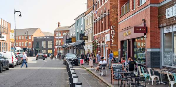 Shops and cafes along the side of a street in the Jewellery Quarter in Birmingham