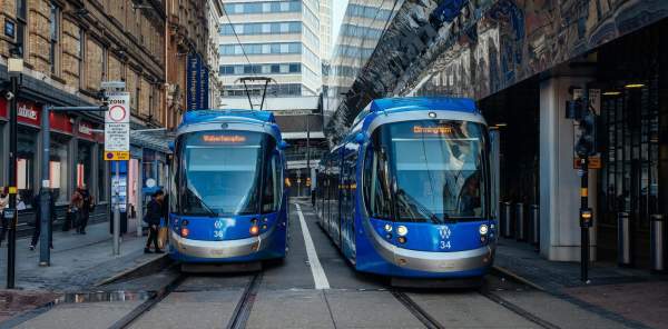 Two blue West Midlands trams