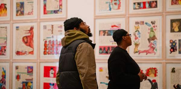 Two people looking at art at BMAG