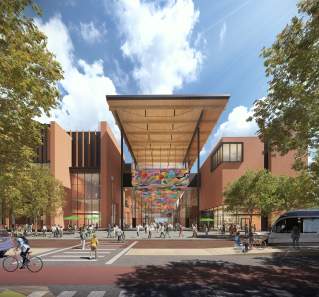 Austin Convention Center rendering showing the new building's West Entrance from street level with pedestrians, cyclists and a light rail along the street. The multi-story building includes a mural along the ceiling of the entrance