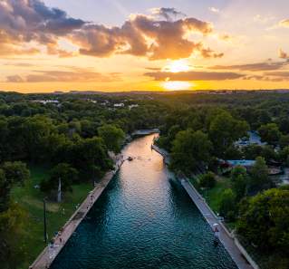 Aerial view of Barton Springs Pool at Sunset in Austin Texas