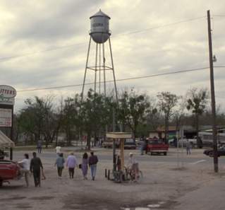 What's Eating Gilbert Grape Screengrab showing townspeople walking towards the Endora Water Tower