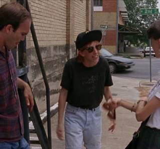 Slacker screengrab, two women and a man talking on the sidewalk at 2nd Street and Guadalupe Street