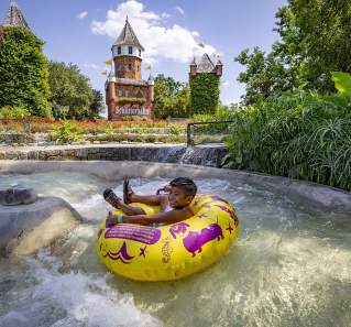 Child tubing at Schlitterbahn Waterparks and Resorts in New Braunfels Texas