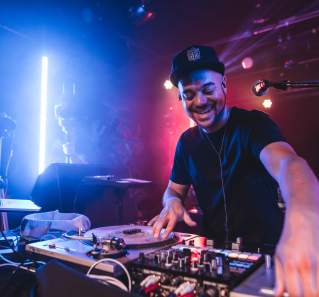 DJ playing music at Empire Control Room & Garage