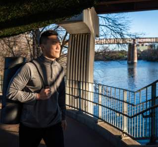 Man walks to Swift Fit Events class near Lady Bird Lake