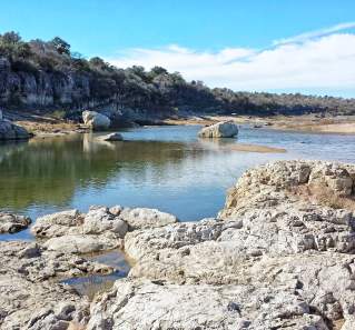 Rocky formations along a winding river.