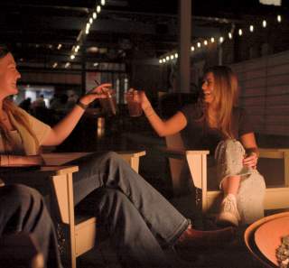 Women enjoying drinks at Old Glory Distillling Co.