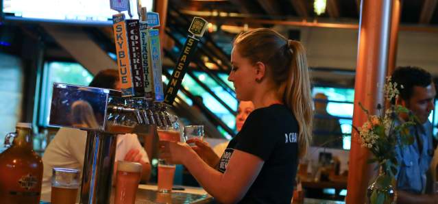 Carolina Brewery Bartender Pouring Draft Beer