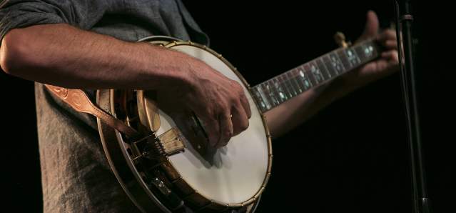Graham Sharp play banjo at Cat's Cradle