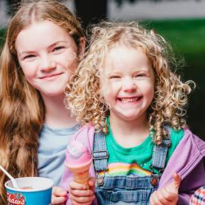 Happy kids eating ice creams