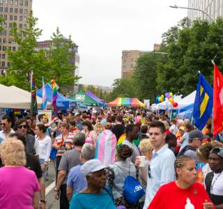 People Walking Among Vendors at RI Pride Parade