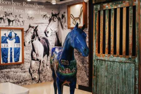 Painted blue horse inside the Lexington Visitors Center