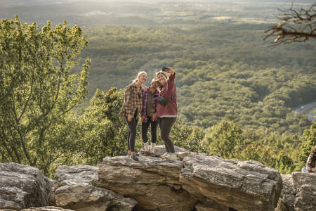 3 women hiking