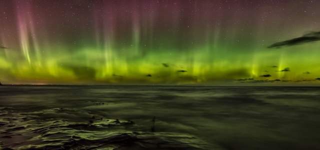 Northern Lights and Stars over Lake Superior horizen.