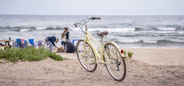 A beach cruiser bicycle on the sands of a Lake Superior Beach