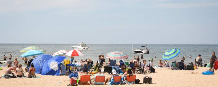 People at Holland State Park Beach