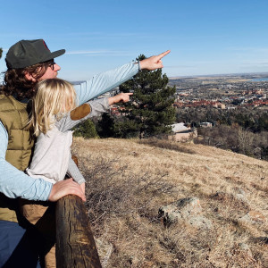 Man and boy hiking in Boulder