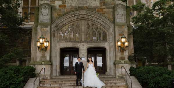 Bride and groom on the steps of U-M Law Quad