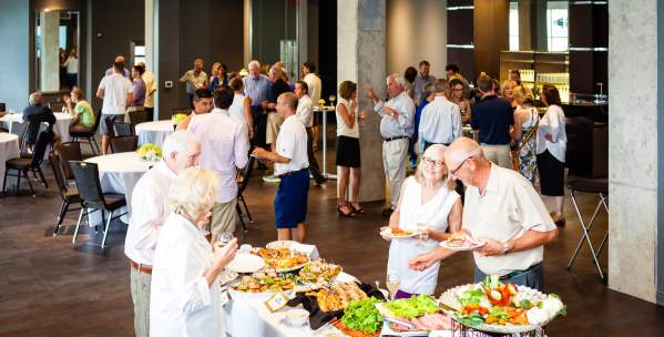 Group enjoying a reception at Zingerman's Greyline