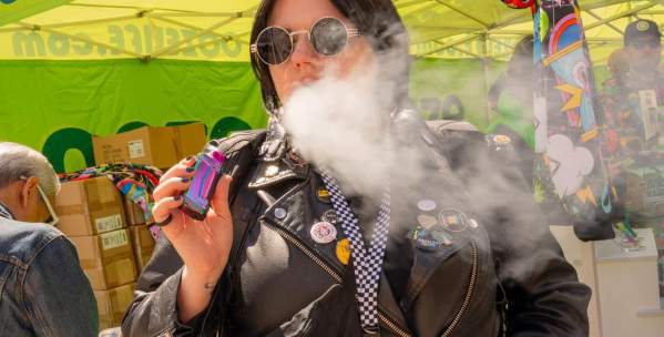 Woman smoking at Hash Bash