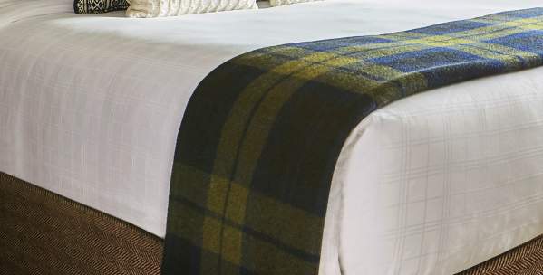 Beds at The Graduate with U-M Pillows