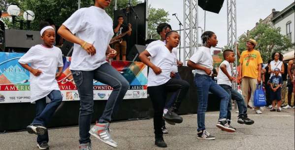 Children perform a dance routine at the African American Summer Festival in Ann Arbor
