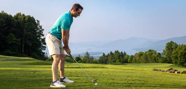 A man golfing at Top of the World