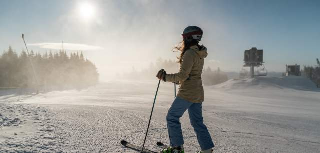 Woman getting ready to ski on Gore Mountain