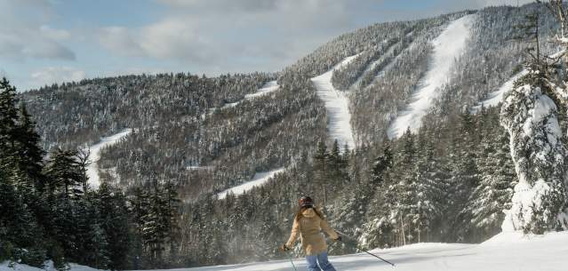 Woman skiing down Gore Mountain