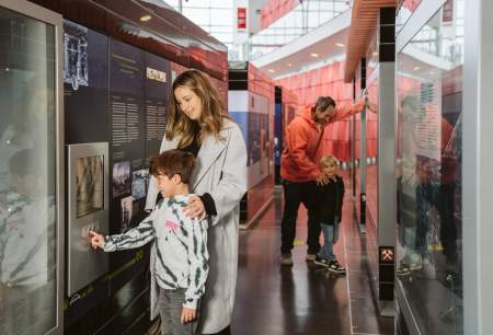 young family exploring the displays in the national waterfront museum