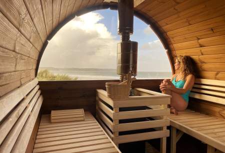 woman relaxing in a sauna at Ty Sawna in oxwich