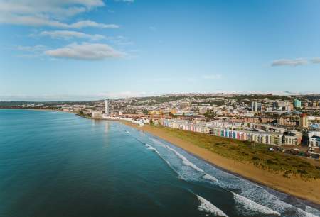 Aerial view of the swansea bay coastline with the marina and city