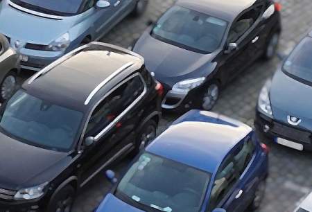 photos of cars in a car park