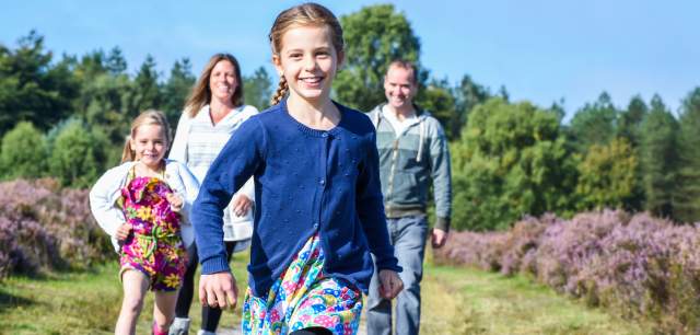 Cannock Chase heathland family walking girls running ahead