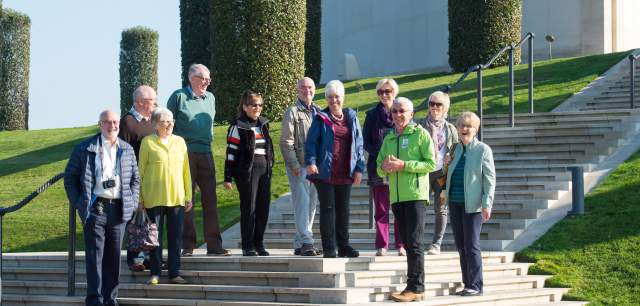 National Memorial Arboretum group talk on steps Armed Forces Memorial