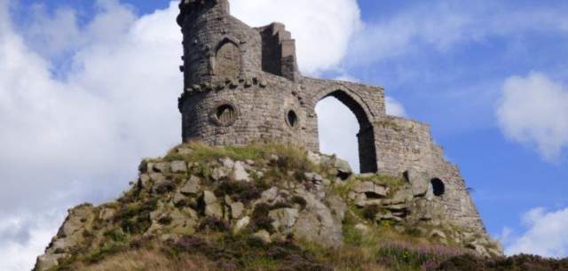 Kidsgrove Mow Cop folly with blue sky