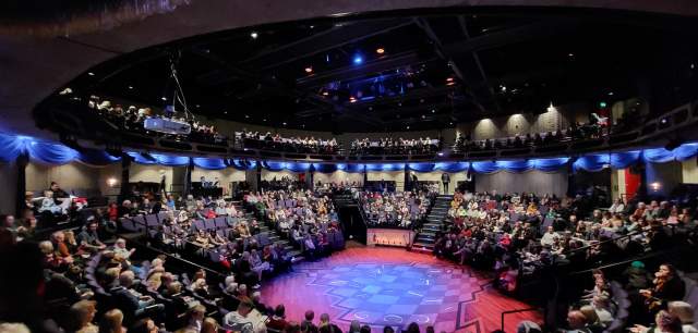 a packed house waits for the show to begin at New Vic Theatre in Newcastle under Lyme