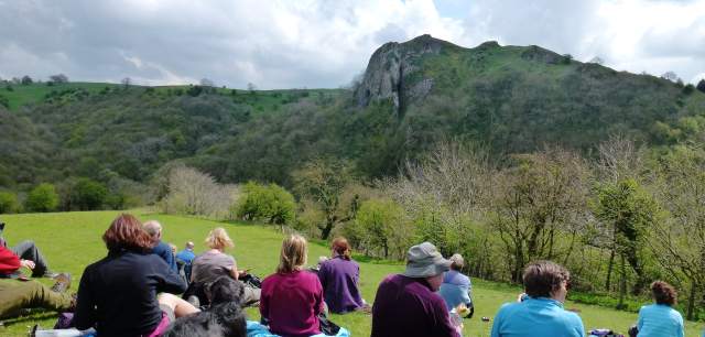 walkers take a break looking at Thor's Cave
