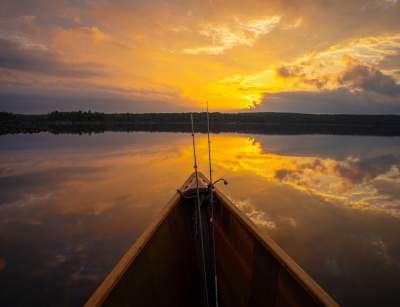 Canoe Fishing at Sunset