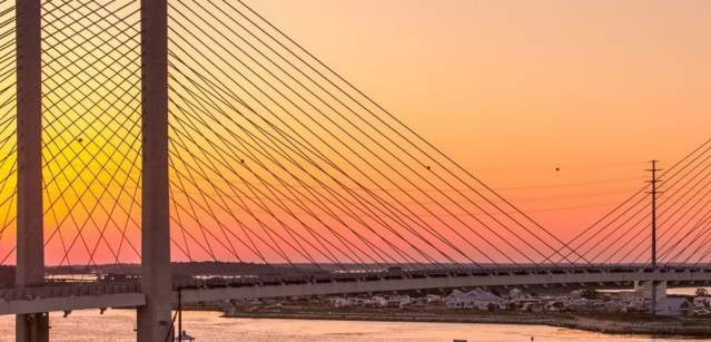 Sunset over the indian river inlet bridge at Bethany Beach