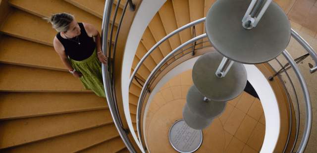 A lone visitor on the spiral staircase at De La Warr Pavilion