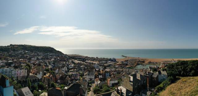Panoramic views of Hastings Old town towards the sea from the top of the hills